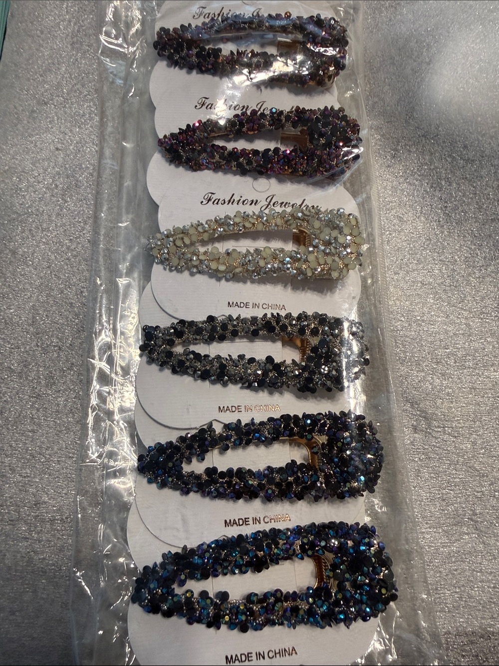 Fashion Jewelry Multicolor Crystal Hair Clip Set - Purple,Gold,Black,Blue. 6/$12